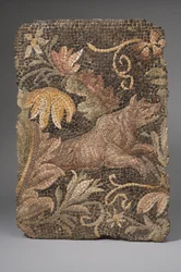 Fragment av en mosaikk som viser en ulv (mosaikk)